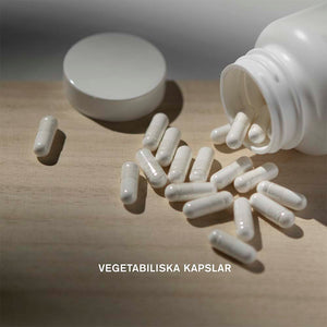 Holistic Multi-Immun 60 kapslar – vegetabiliska Multi Immun-kapslar bredvid öppen burk