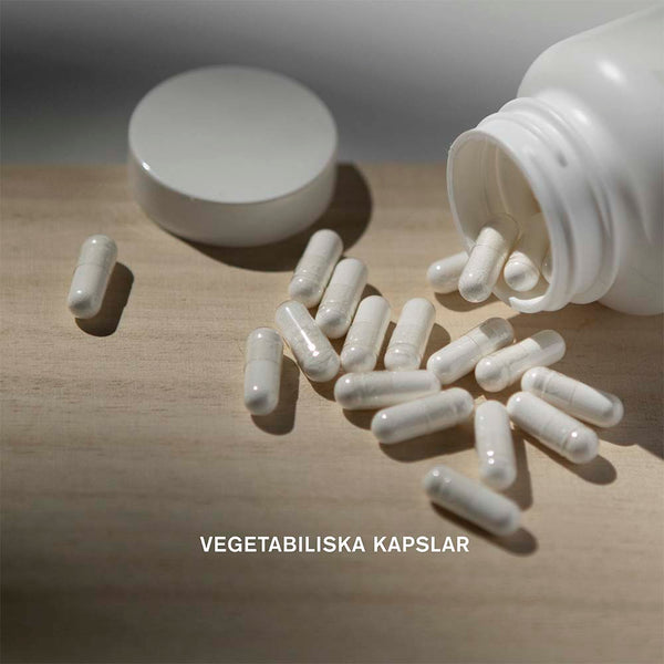 Holistic Multi-Immun 60 kapslar – vegetabiliska Multi Immun-kapslar bredvid öppen burk