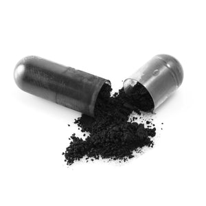 Kiki Health Activated Charcoal 50 kapslar – öppnad Activated Charcoal-kapsel med kolpulver