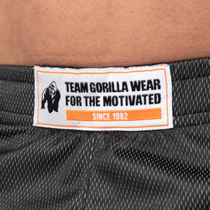 Gorilla Wear Wallace Mesh Pants Grey/Orange – närbild av linning och märke