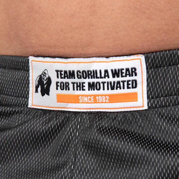 Gorilla Wear Wallace Mesh Pants Grey/Orange – närbild av linning och märke